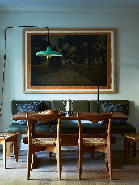 Narrow and Dark Like a European Townhouse, This 1900s Home Called for the Owner’s Favorite White Paint